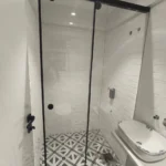 Frameless glass shower cubicle for modern bathroom